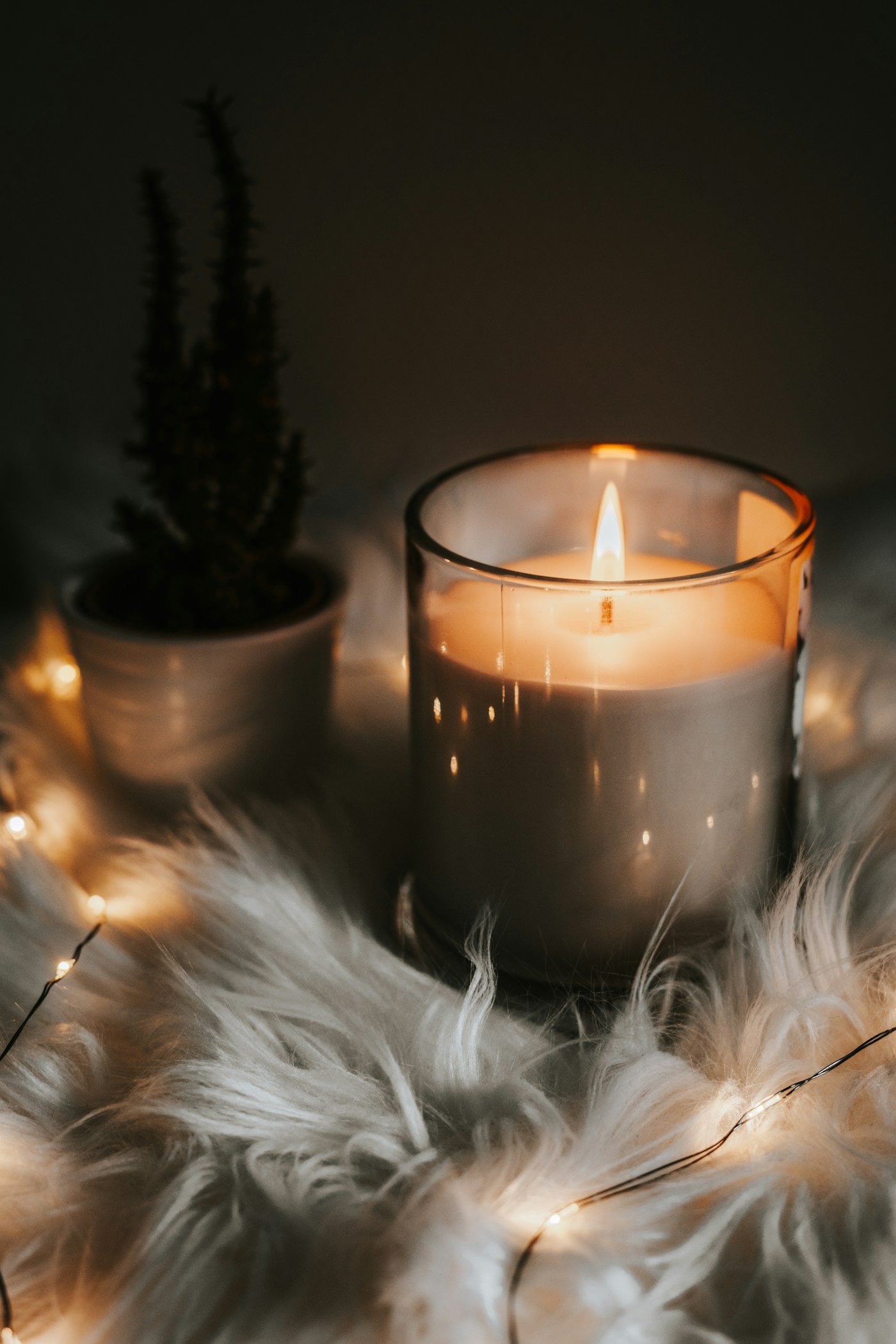 A warmly glowing candle